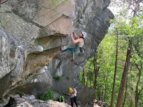 a man rock climbing