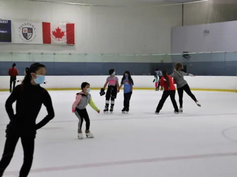 a group of people on an ice rink