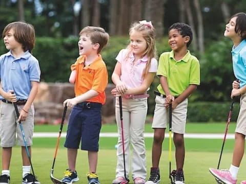 a group of kids holding sticks