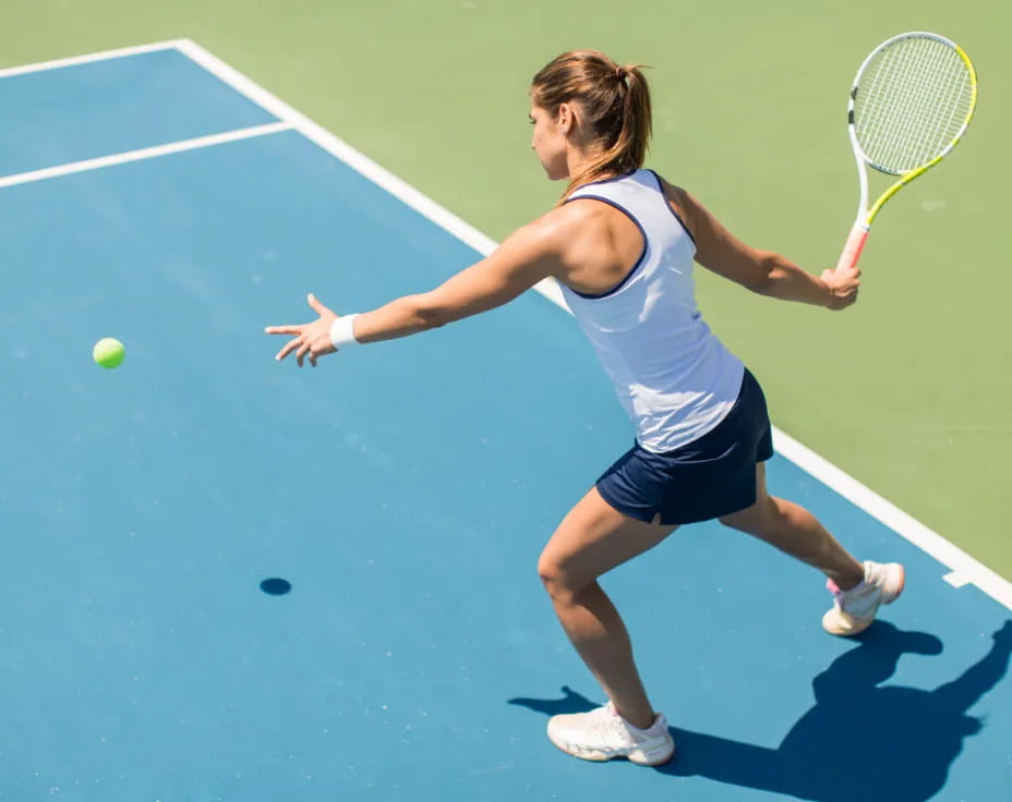 a woman playing tennis