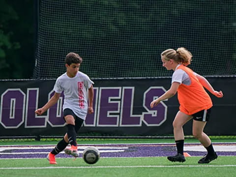 a group of people playing football