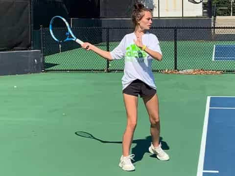 a woman playing tennis