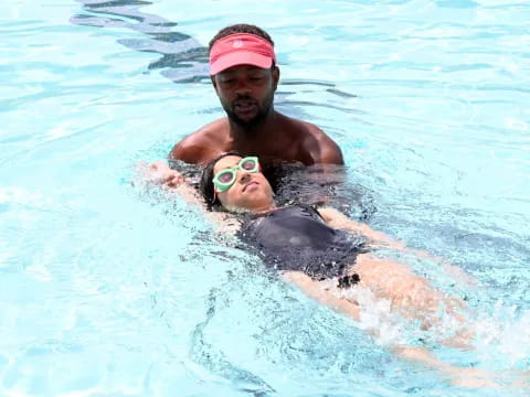 a man and a woman in a pool