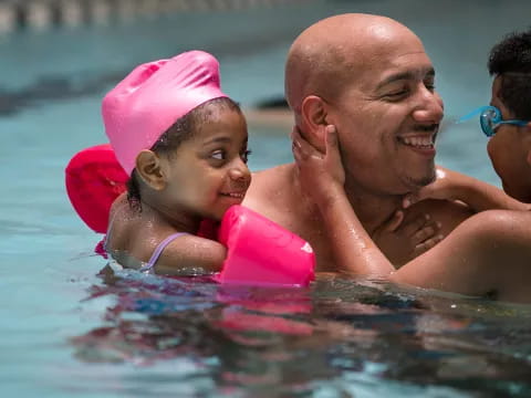 a man and a child in the water