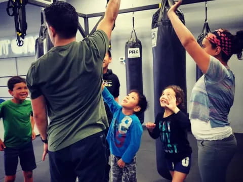 a group of people lifting weights