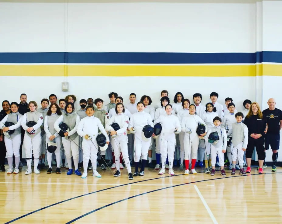 a group of people in white uniforms