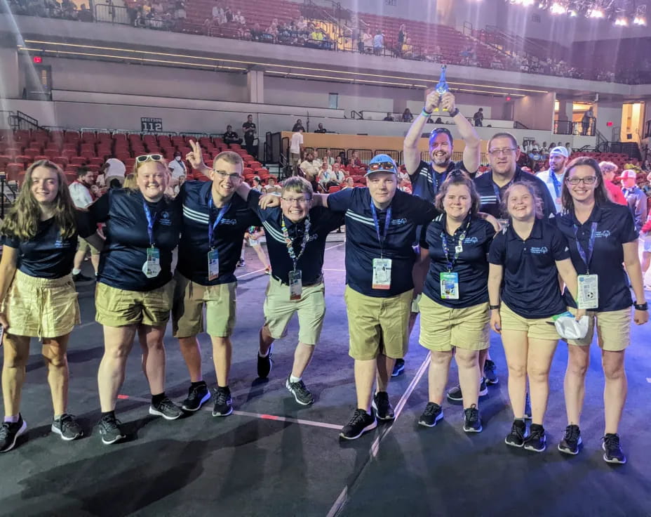 a group of people posing for a photo