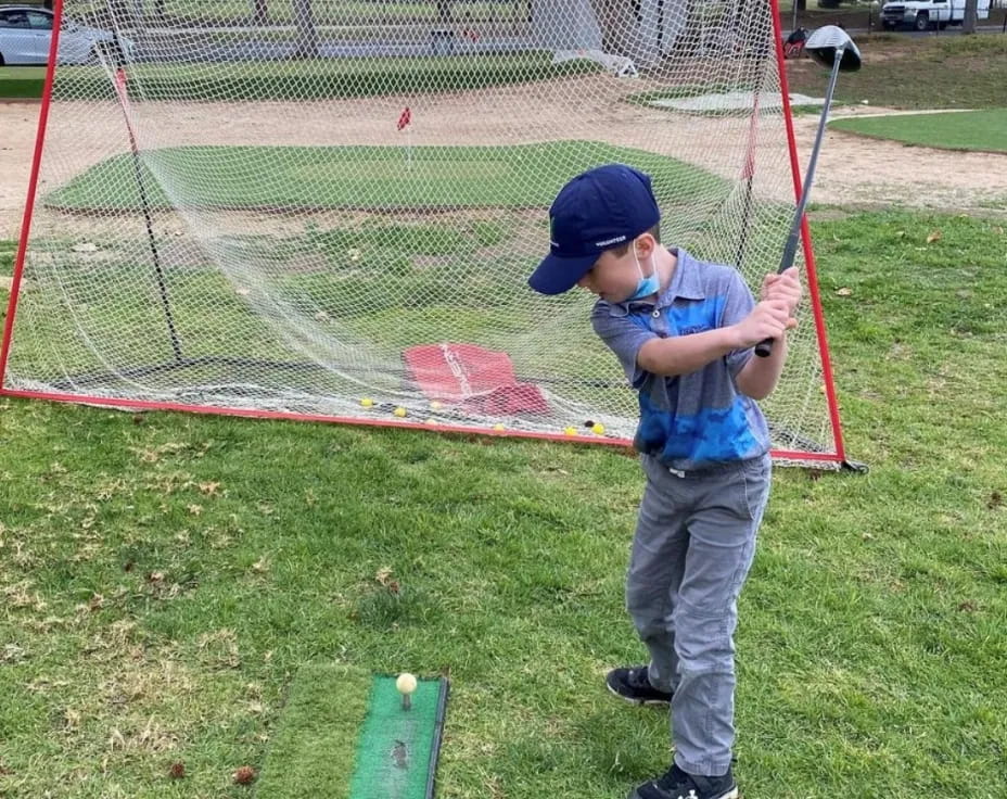a kid playing baseball