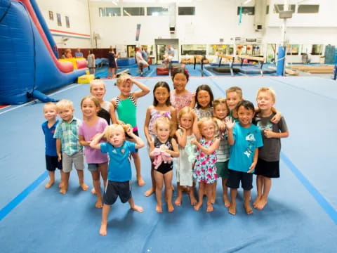 a group of children posing for a photo