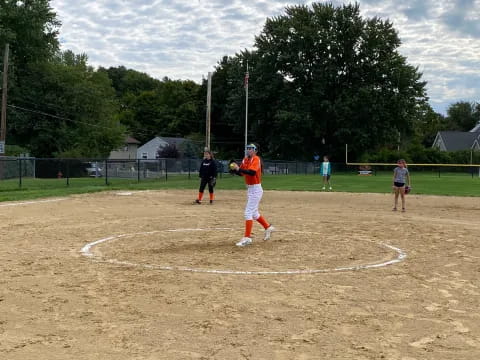 a baseball player prepares to throw a baseball