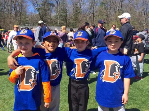 a group of boys in baseball uniforms