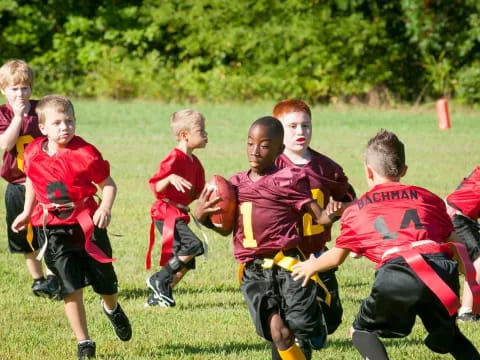 a group of boys playing rugby