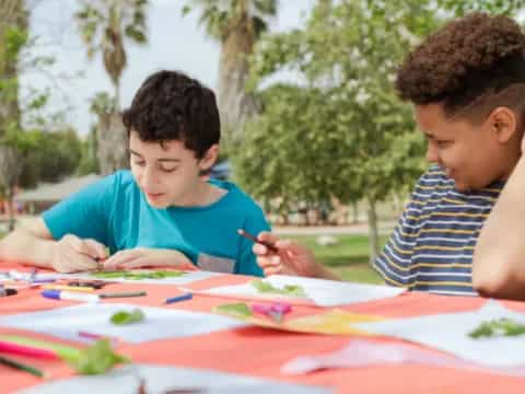 a couple of boys painting