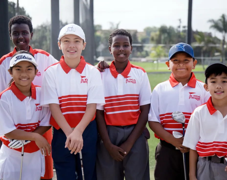 a group of boys in sports uniforms