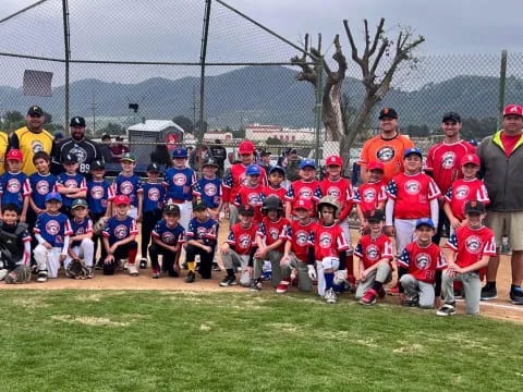 a group of kids posing for a photo