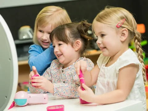 a group of children playing with toys