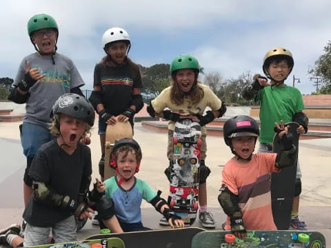 a group of kids with skateboards
