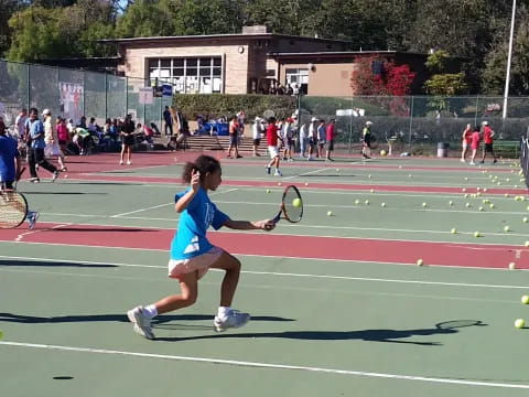 a girl playing tennis