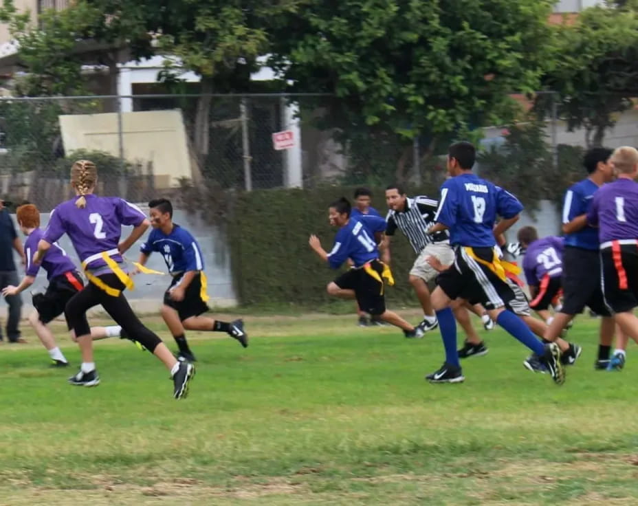 a group of men playing rugby