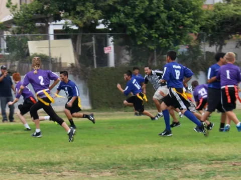 a group of men playing rugby