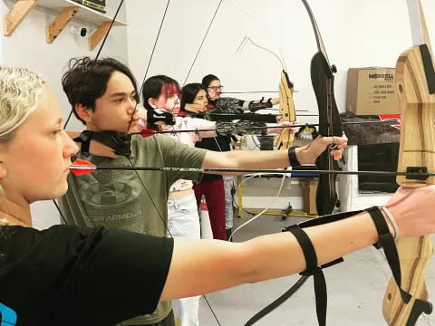 a person holding a bow and arrow