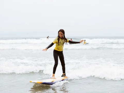 a person on a surfboard in the ocean