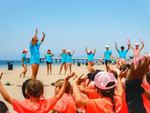 a group of people on a beach