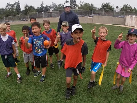 a group of kids posing for a picture