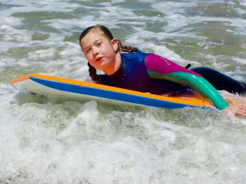 a person riding a surfboard