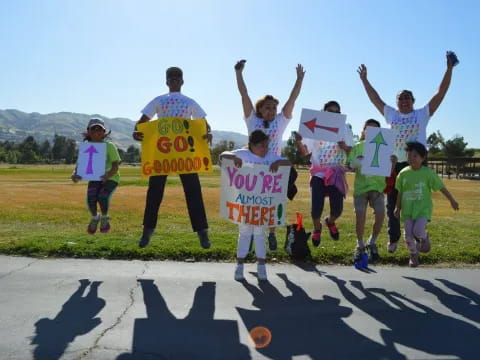 a group of people holding signs