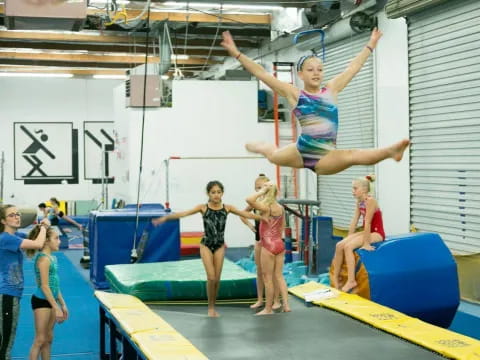 a group of people in a gym