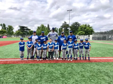 a group of baseball players posing for a photo