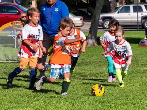 kids playing football on a field