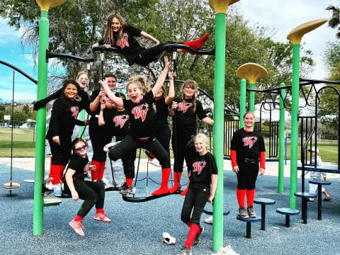 a group of people jumping on a trampoline