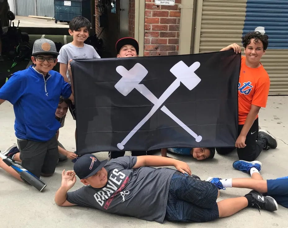 a group of people holding a flag