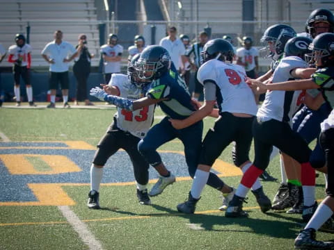 a group of people playing football