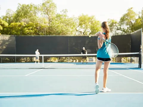 a woman playing tennis