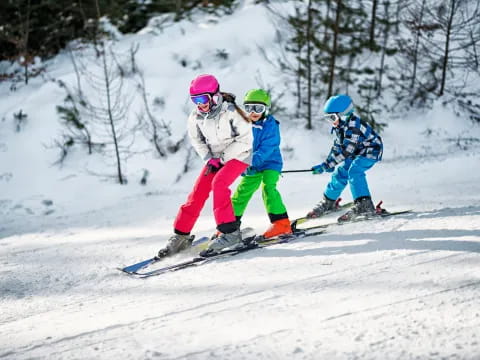 kids skiing on the snow