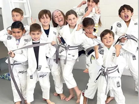 a group of people in karate uniforms