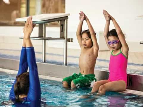 a group of people in a pool