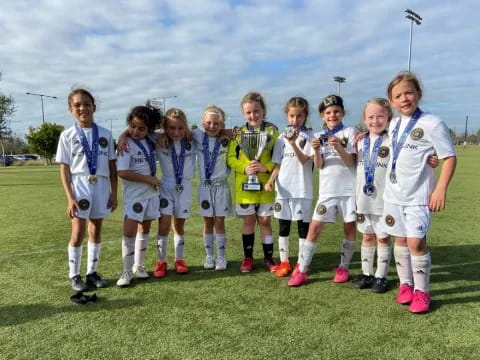 a group of girls in football uniforms