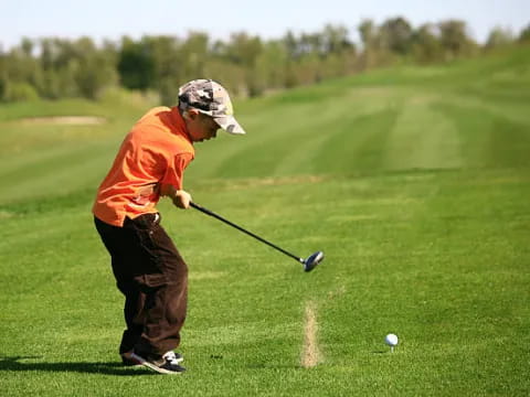 a man playing golf