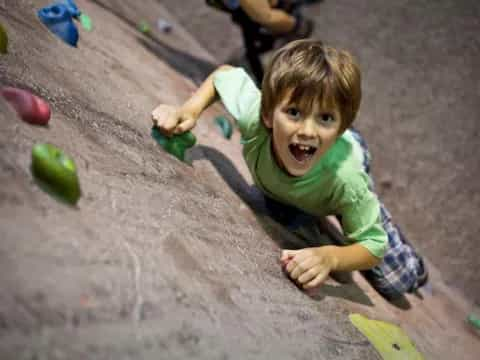 a child playing in the sand