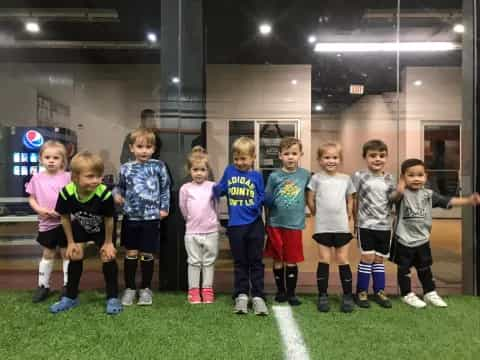 a group of children posing for a photo