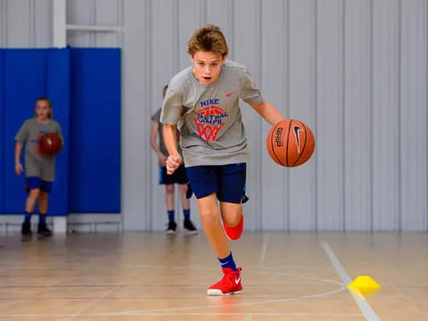 a boy playing basketball