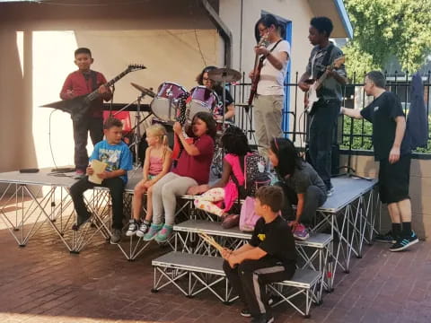 a group of people playing instruments