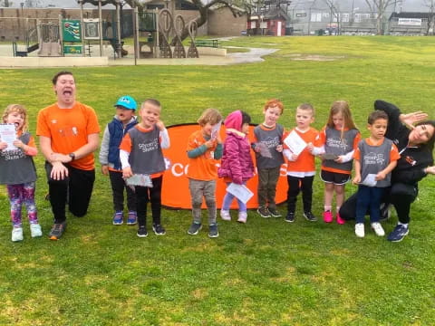 a group of children posing for a photo