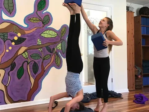 a couple of women doing yoga