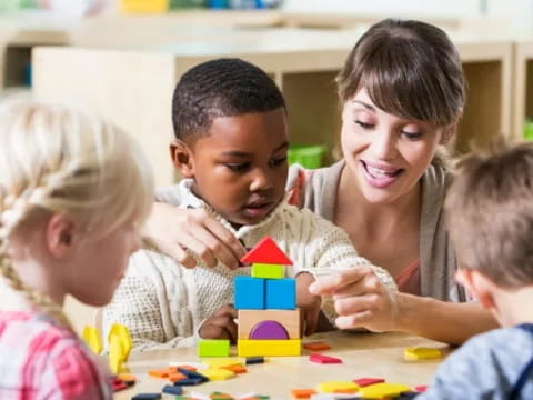 a group of children playing with toys