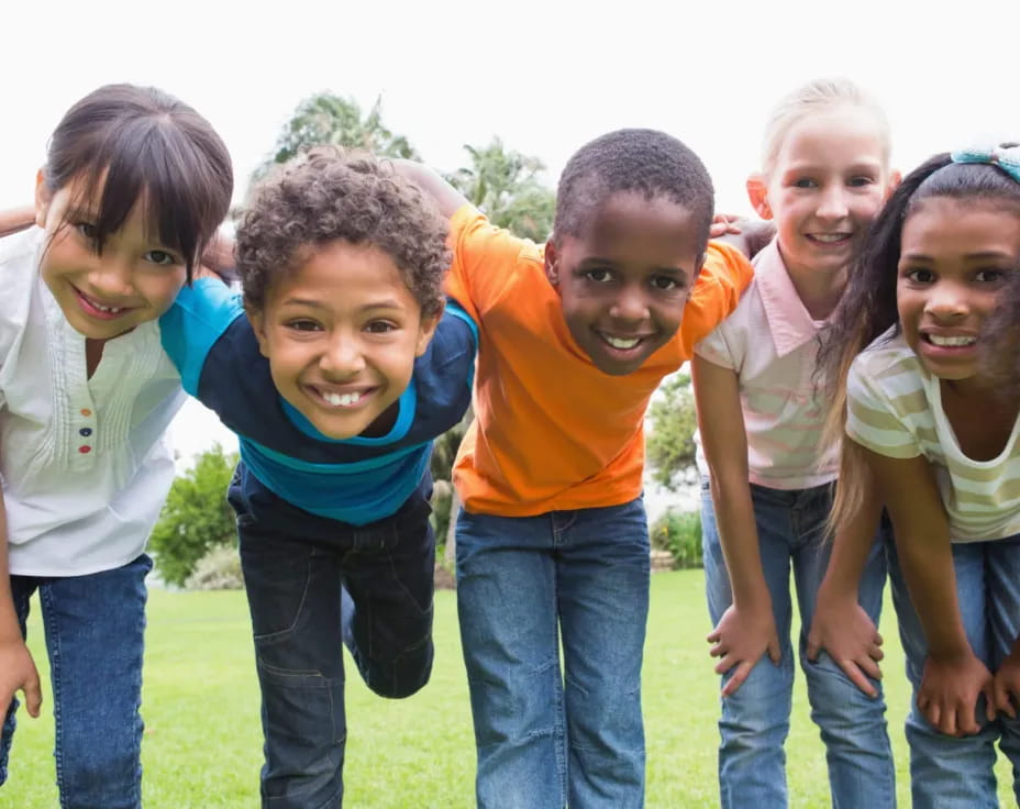 a group of children posing for a photo